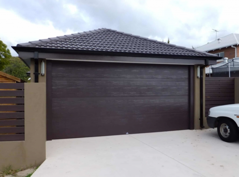 residential-garage-door-brown-with-driveway